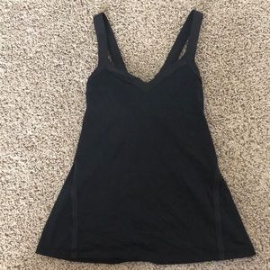 Black lulu lemon tank top with cross cross straps